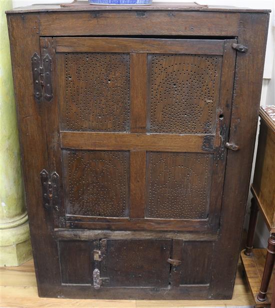 An 18th century French oak bread cupboard, H.117cm